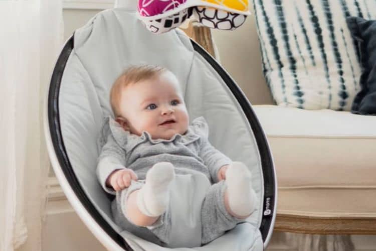 When should a baby stop sleeping in a swing?