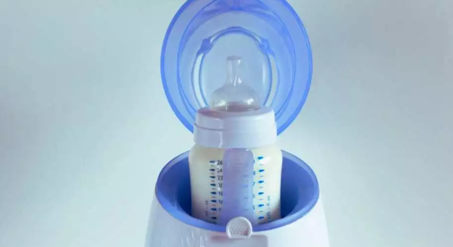 What are the ways to keep a baby's bottle warm during the night
